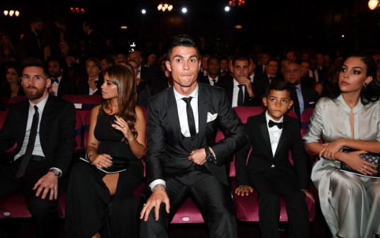 Cristiano Ronaldo, Lionel Messi and their Respective Spouses at the Awards