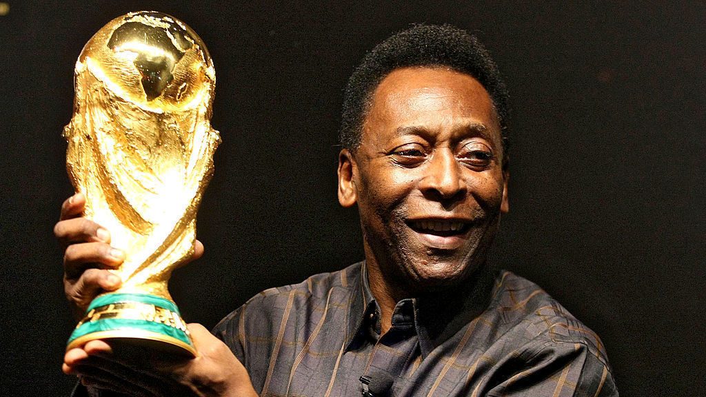 Brazilian soccer star Pele displays the FIFA World Cup