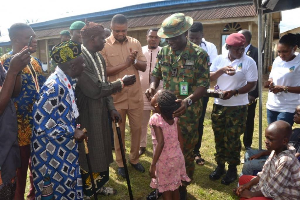 Soldier administering drug