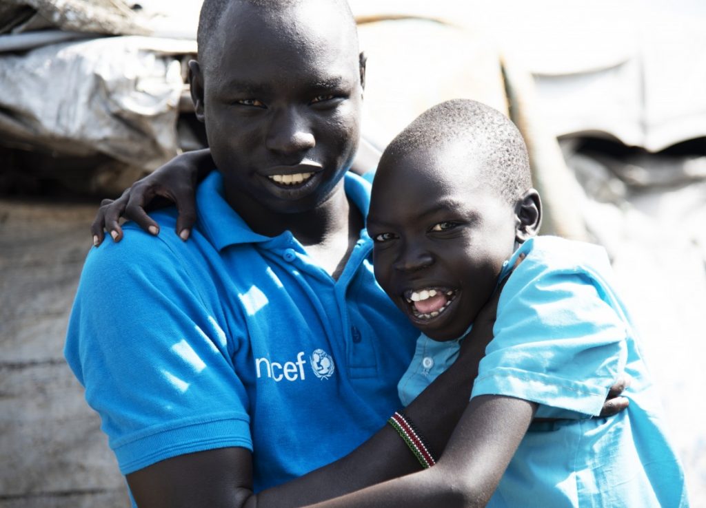 Boy reuniting with father