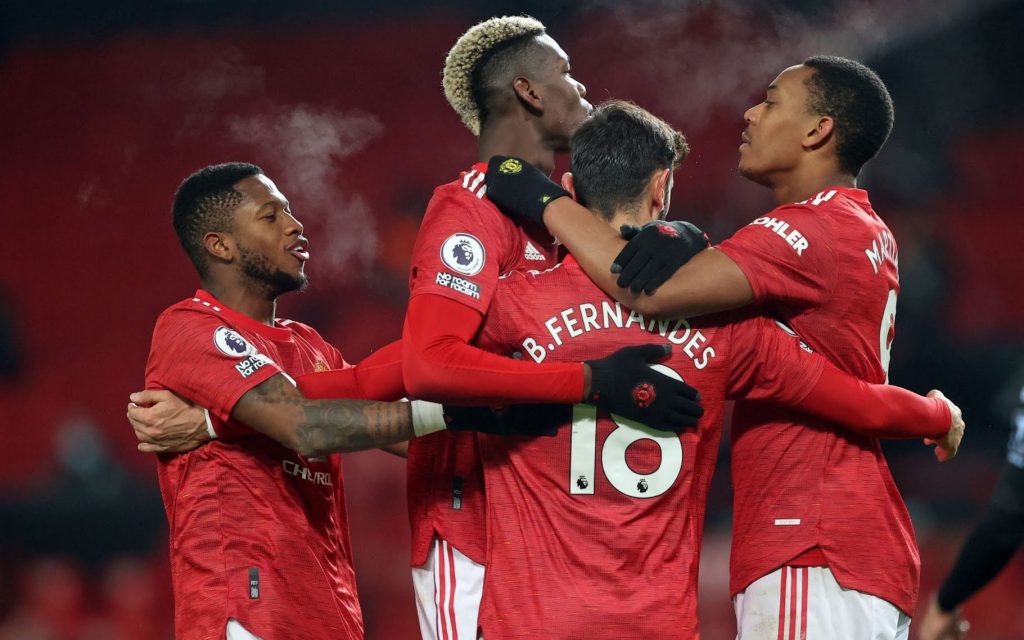 Manchester United's players celebrating straightnews