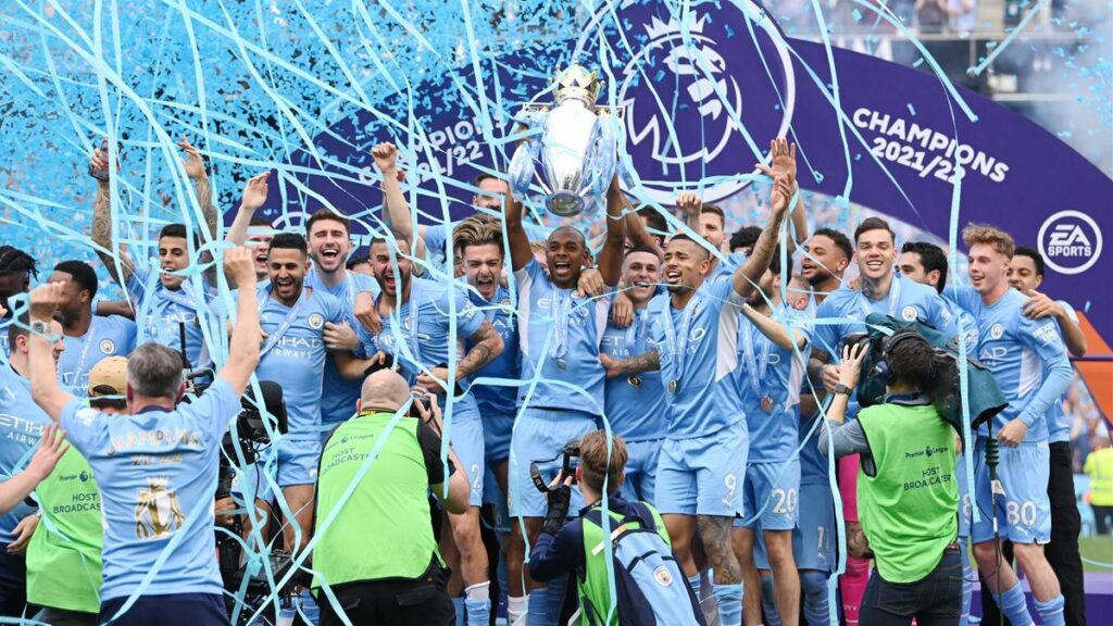 Manchester City lifting the EPL Cup title cup after beating Aston Villa- straightnews