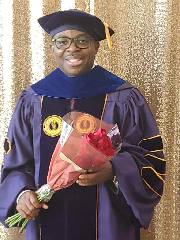 Rev Fr. Emmanuel Sebastian Udoh hooded as Ph.D Information Science (University of Albany)- straightnews