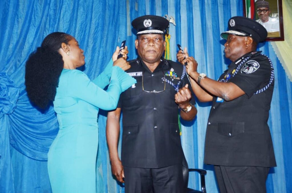 Inspector General of Police, Alkali Baba Usman, decorated Andrew Amiengheme, (AIG), Assistant Inspector General of Police (AIG)- straightnews