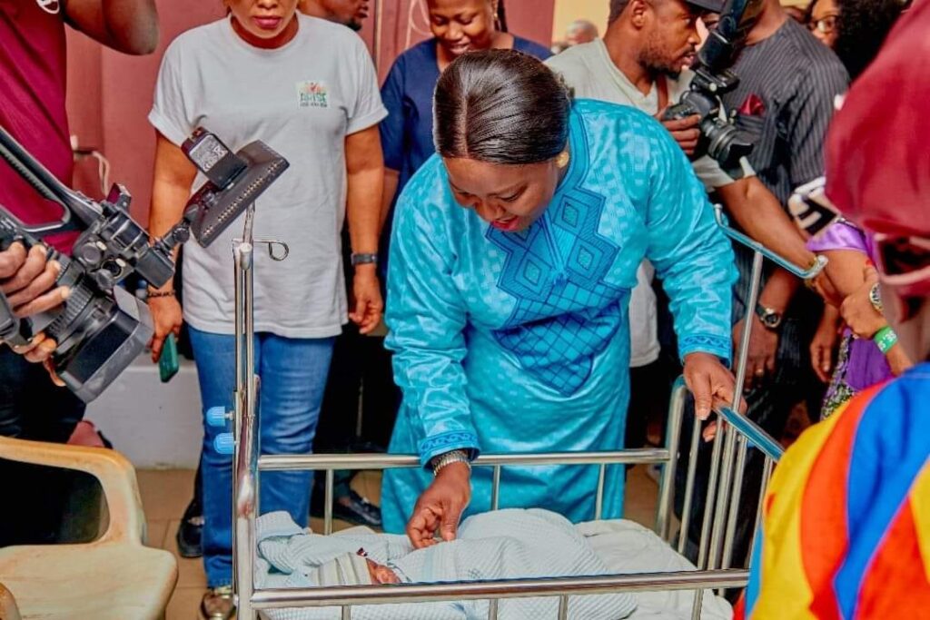 Pastor Patience Umo Eno inspecting New Year baby- Straightnews