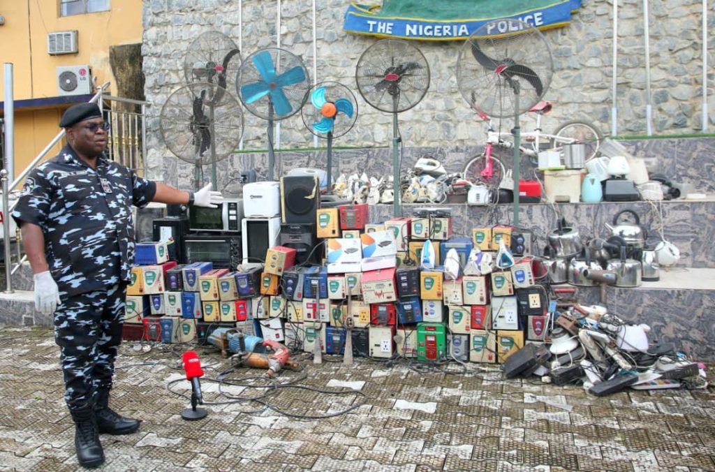 The State Commissioner of Police, Baba Mohammed Azare showing stolen items - Straightnews