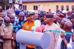 The state Commissioner for Power, Mr. Iniobong Robson fanked by Rt. Hon. Unyime Idem, unveiling the transformers - Straightnews