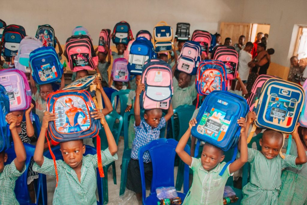 Coy Delivers Educational Materials to Eastern Obolo School Pupils displaying educational materials - Straightnews